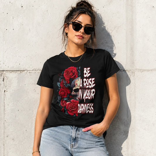 Woman wearing Be A Rose In Your Darkness black skull and roses graphic tee in an urban lifestyle setting – Black Heart Tees motivational apparel