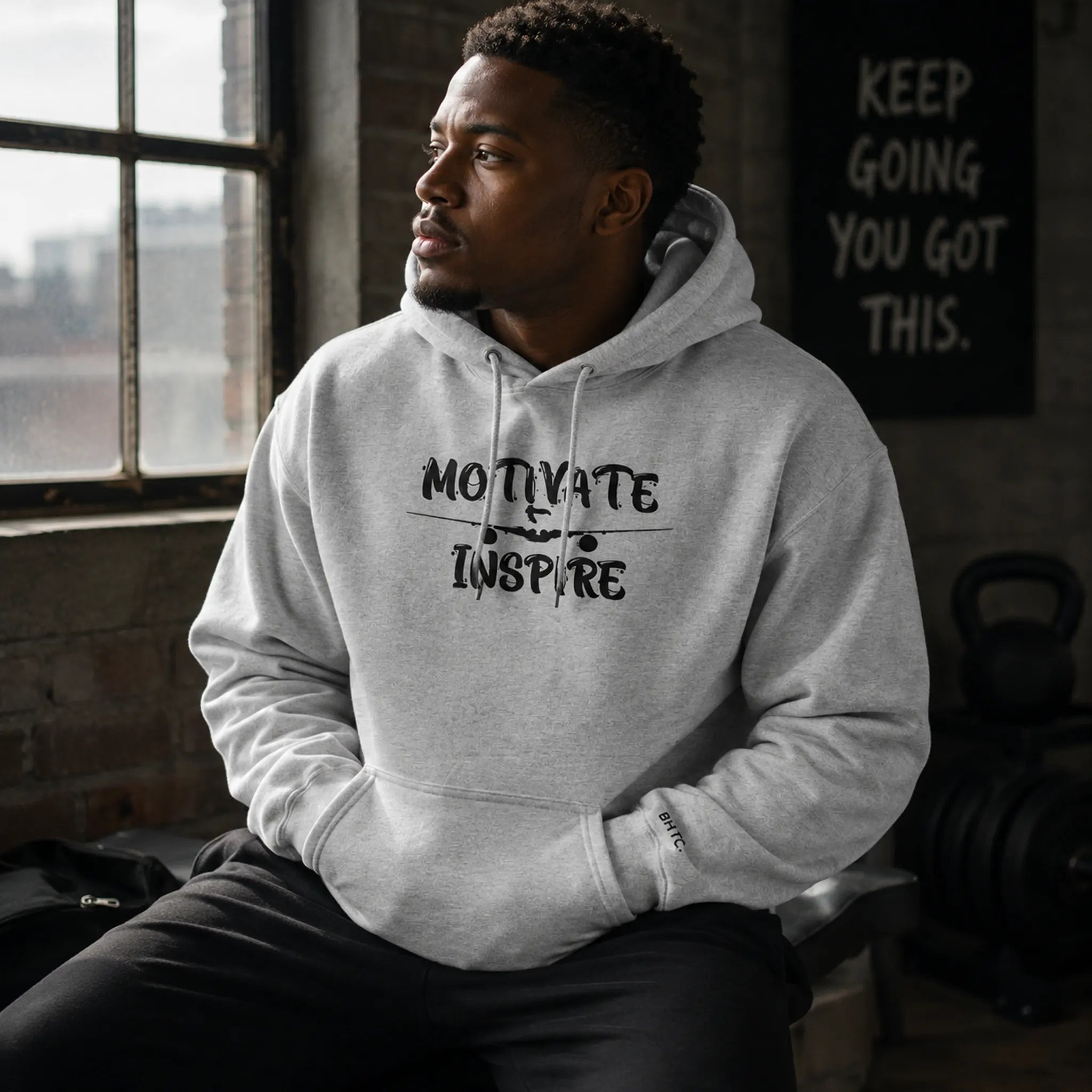 Couple wearing matching red King and Queen Hoodies – empowering streetwear from the Hoodies Collection by Black Heart Tees