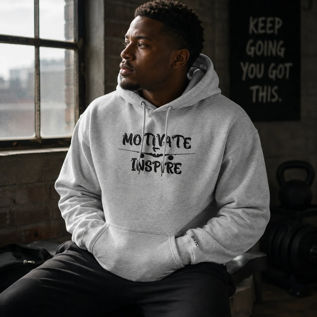 Couple wearing matching red King and Queen Hoodies – empowering streetwear from the Hoodies Collection by Black Heart Tees