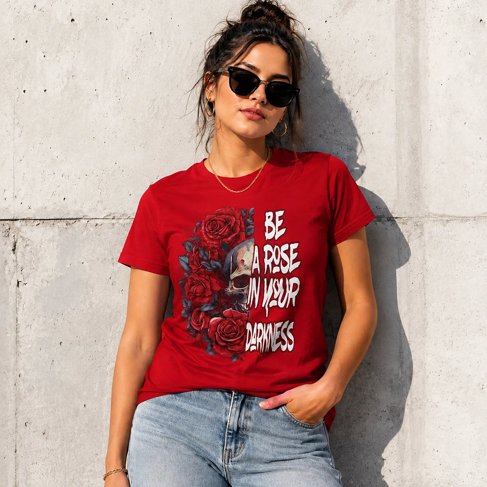 Woman wearing Be A Rose In Your Darkness red graphic tee with skull and roses design in an urban setting – Black Heart Tees motivational apparel
