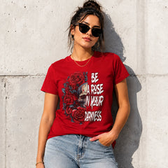 Woman wearing Be A Rose In Your Darkness red graphic tee with skull and roses design in an urban setting – Black Heart Tees motivational apparel