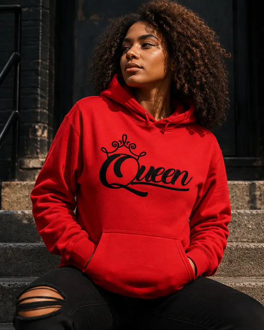 Woman wearing the Queen Women's red hoodie featuring a crown graphic, premium motivational streetwear hoodie designed for confident women and everyday casual fashion.